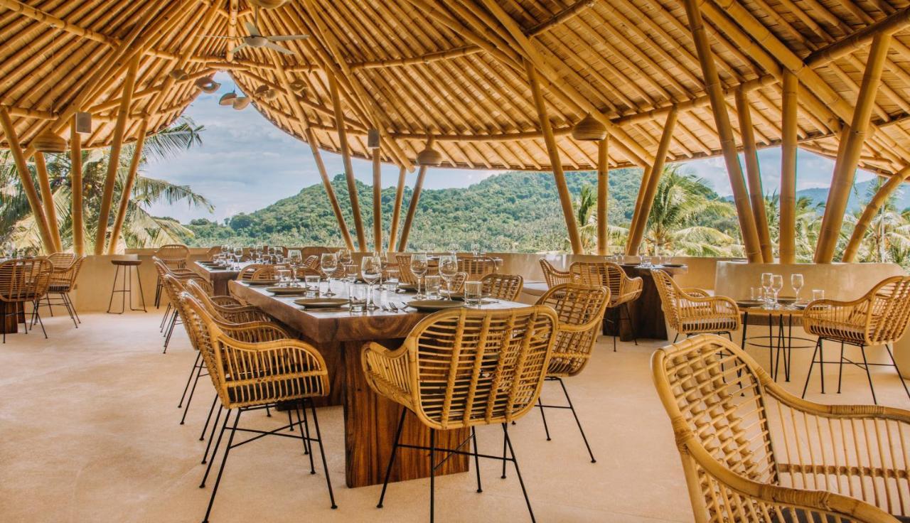 Hotel Neano Escape Manggis Esterno foto The restaurant at the resort