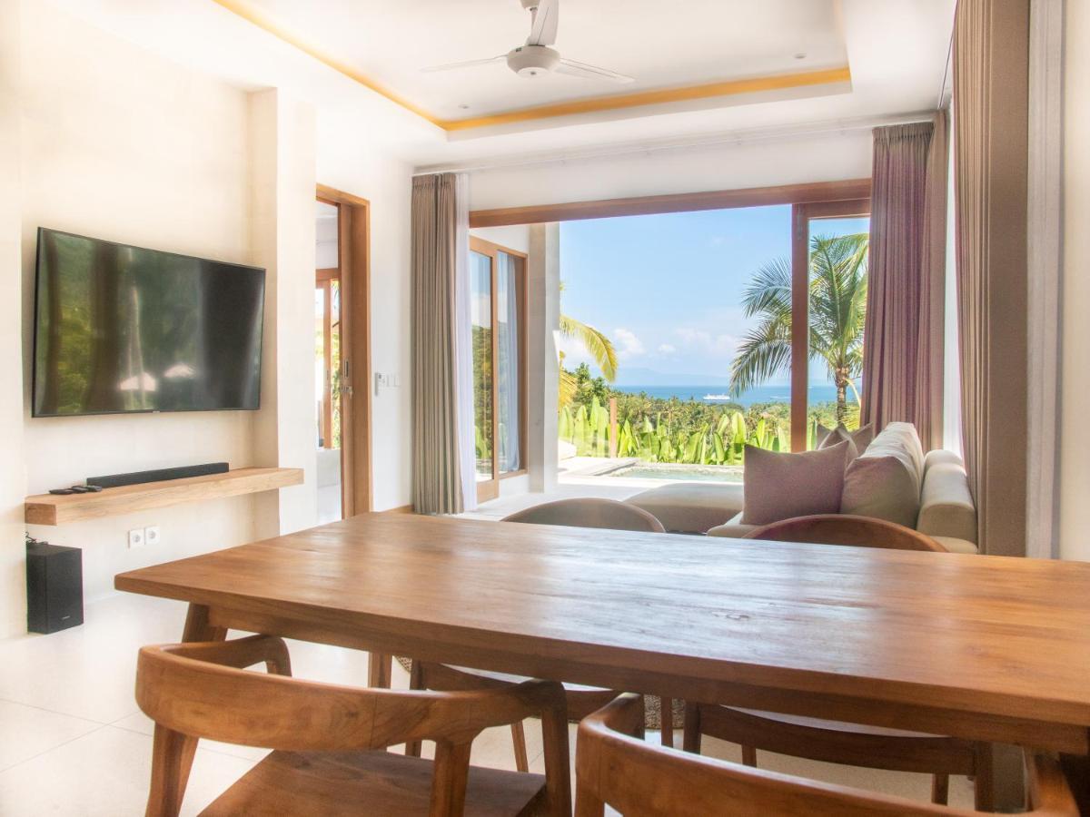 Hotel Neano Escape Manggis Esterno foto Living room at the Beachfront Pool Villa